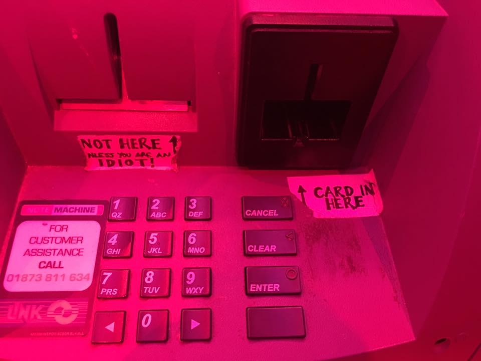 Sign on ATM at Dive Bar